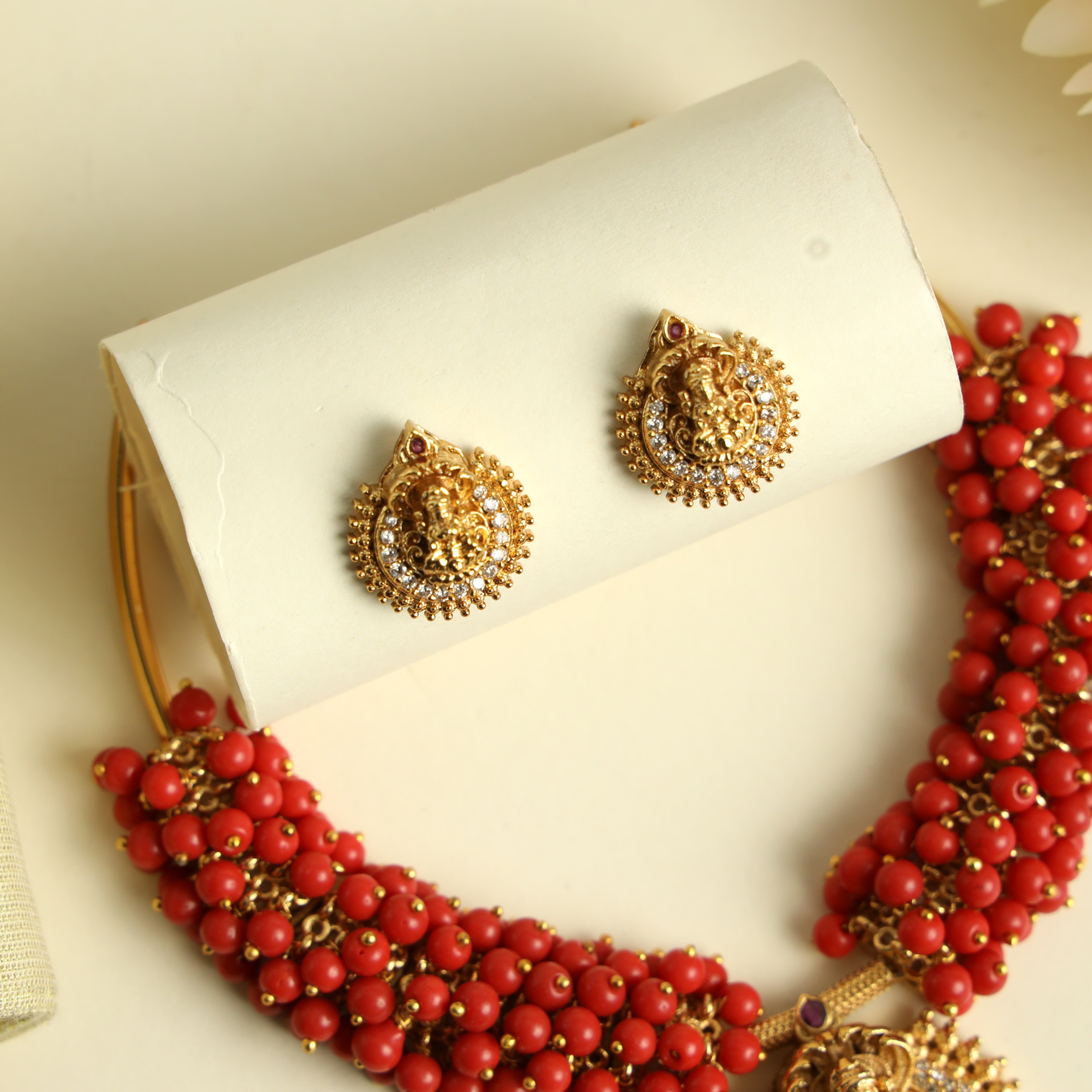 Antique Gold AD Lakshmi Pendant Hasli Set - Coral