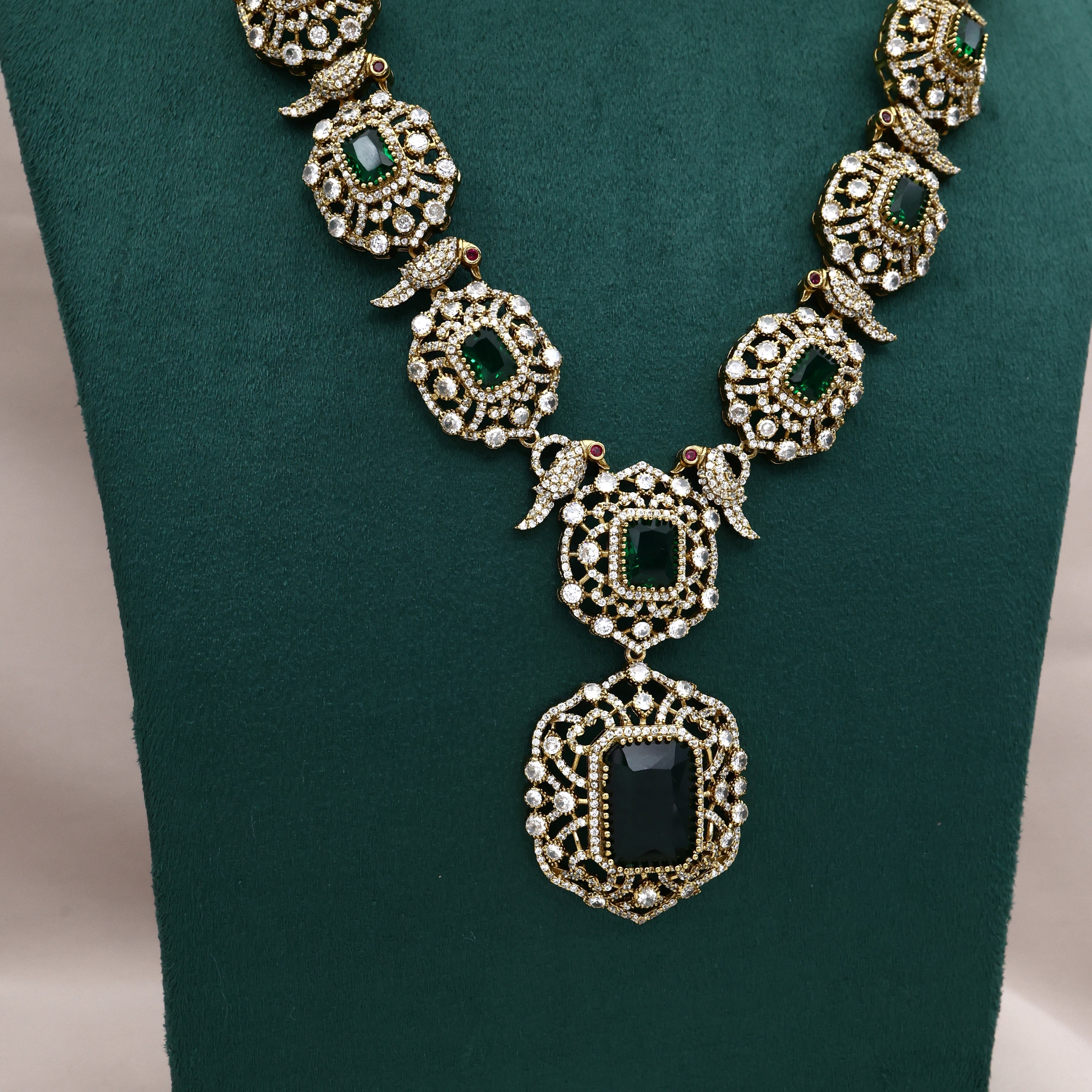 Premium Diamond Look Nita Ambani Inspired Mid Length Necklace Set - Emerald Green