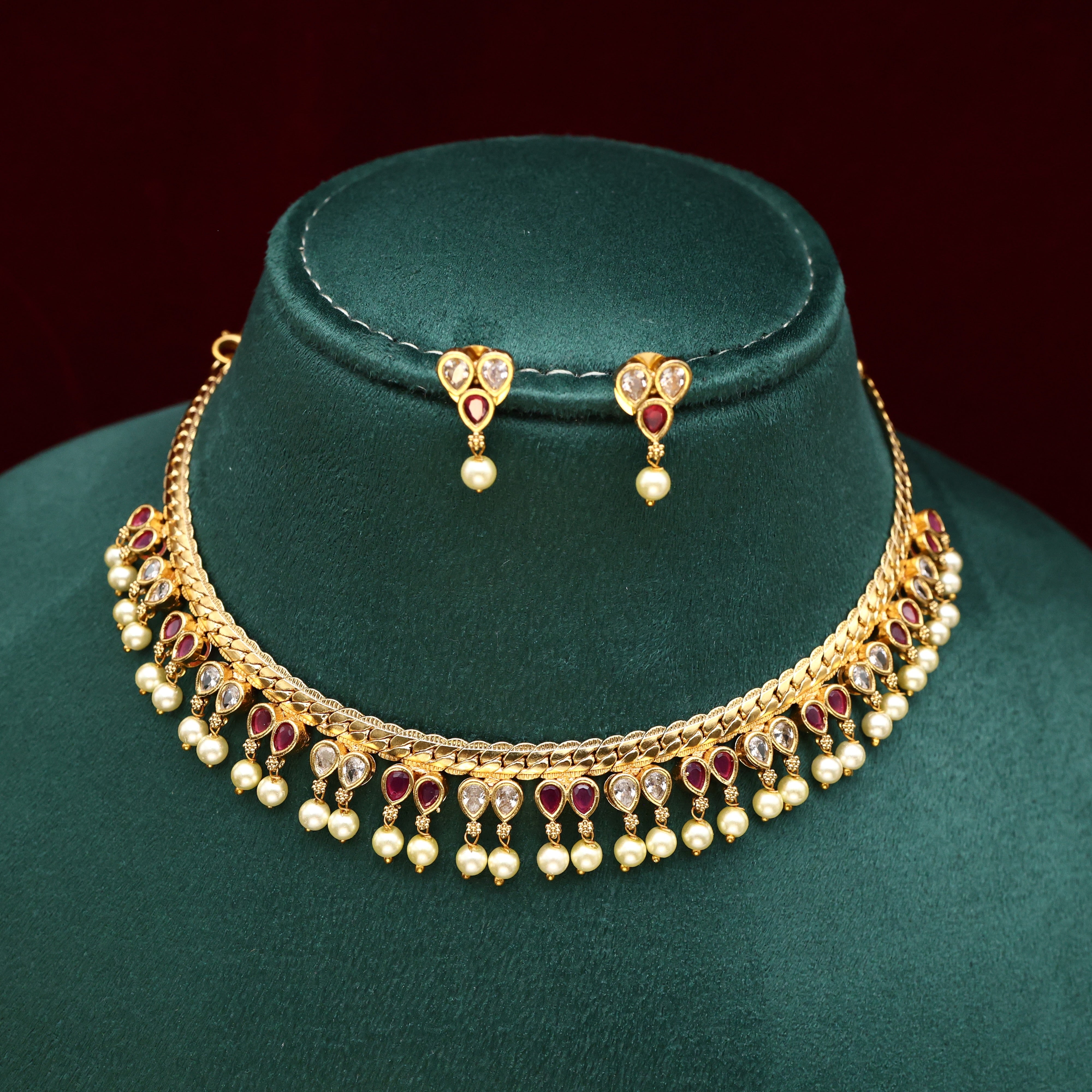 GOLD TONE AD THILAK DROPS NECKLACE SET - WHITE & RUBY