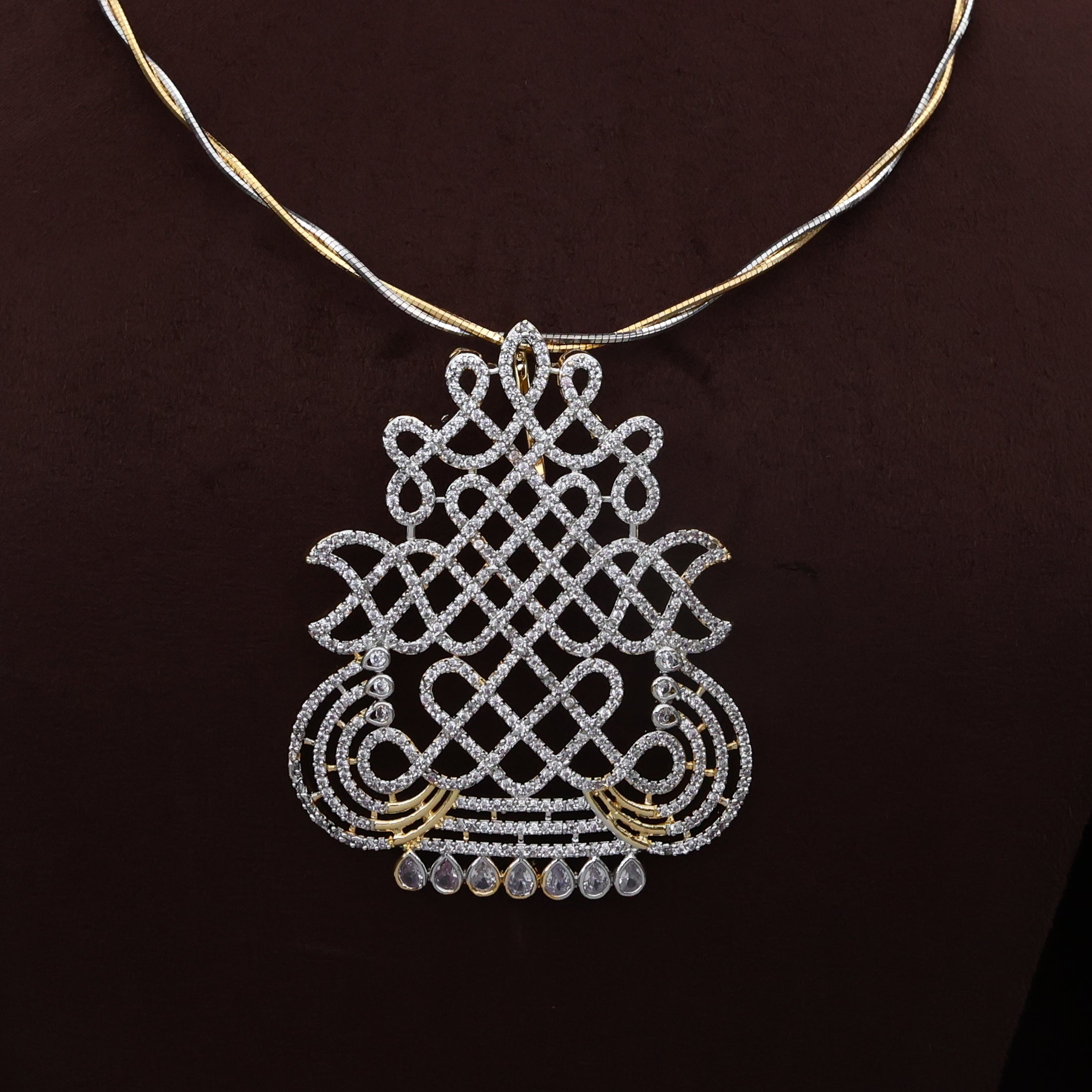 Diamond Look Twisted Two Tone Hasli Kalash Muggulu/Kolam Pendant Set