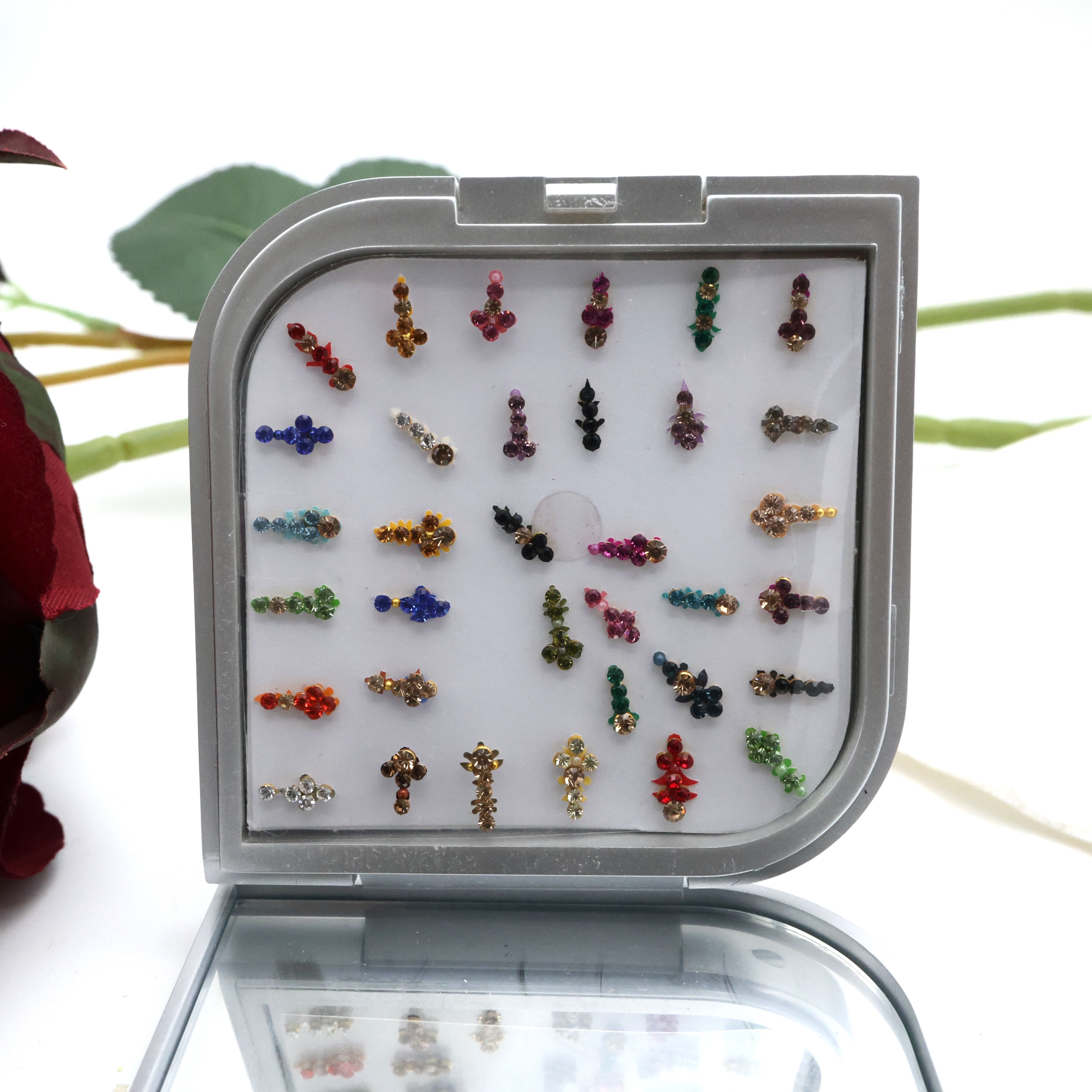 PREMIUM FANCY FLOWER TILAK STONE WORK BINDI BOX WITH MIRROR