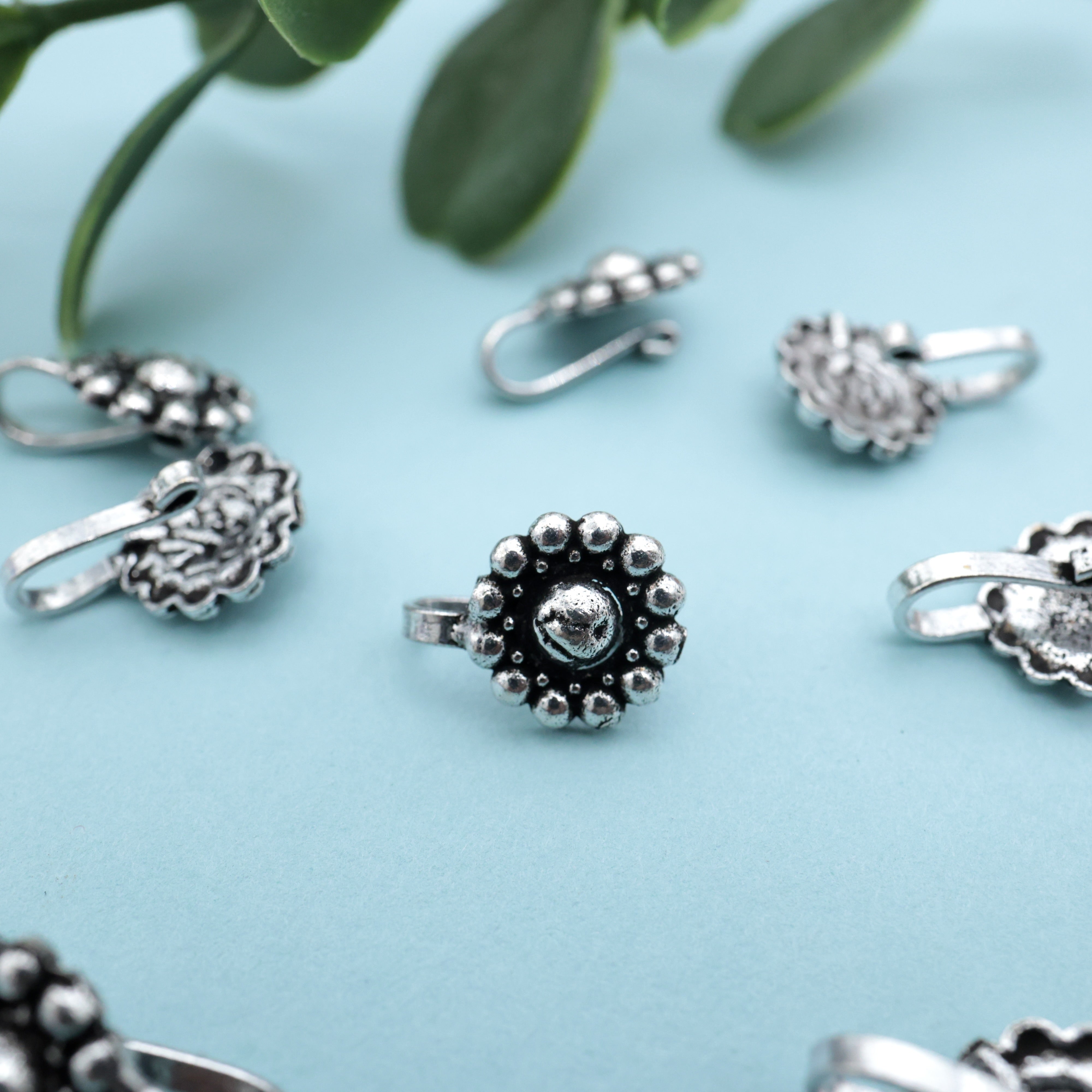 German Silver Oxidised Flower Clip On Nosepin - German Silver Nose Pins For Non-Pierced Nose