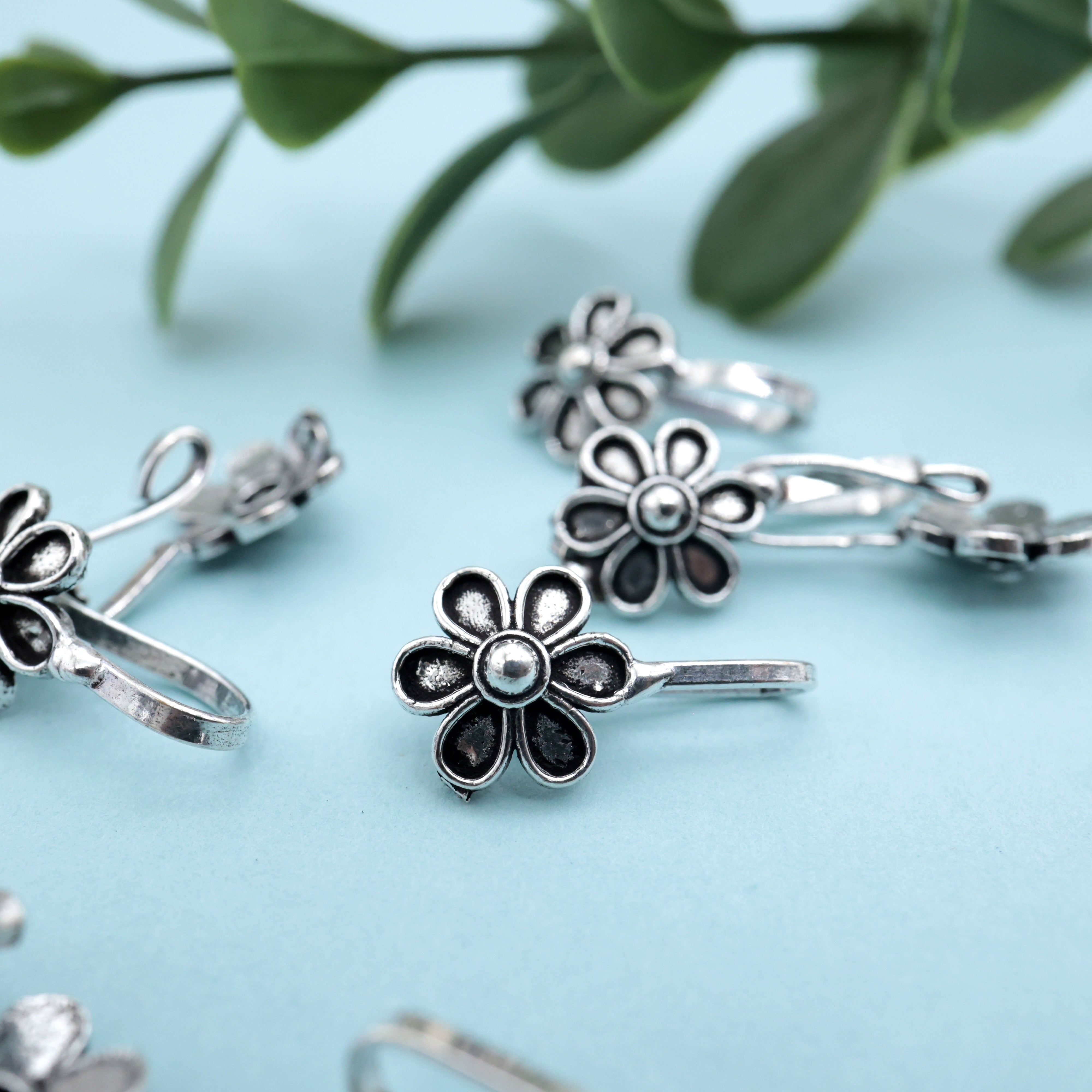 German Silver Oxidised Flower Clip On Nosepin - German Silver Nose Pins For Non-Pierced Nose