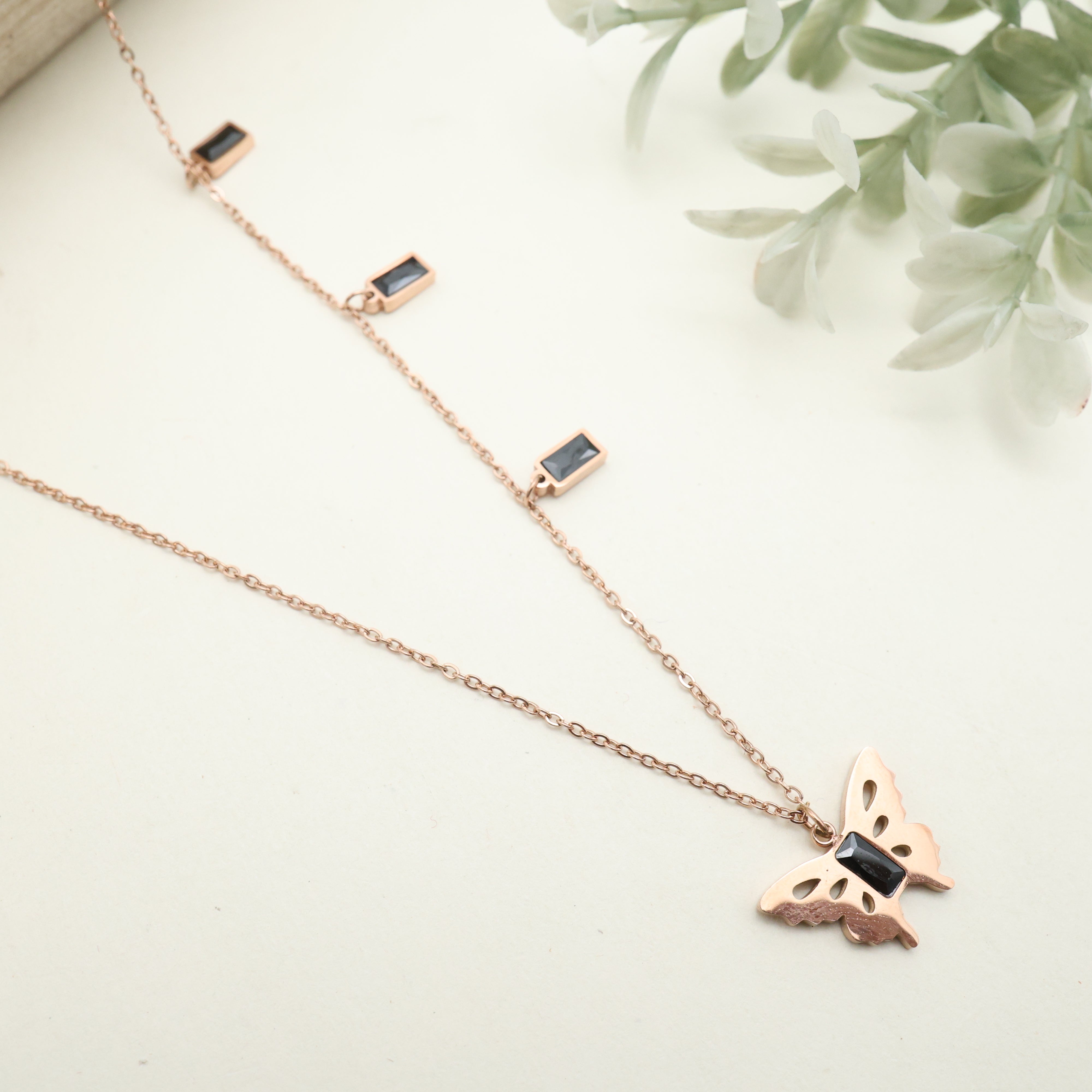 ROSE GOLD TONE ANTI TARNISH SHORT CHAIN - BLACK BARS BUTTERFLY