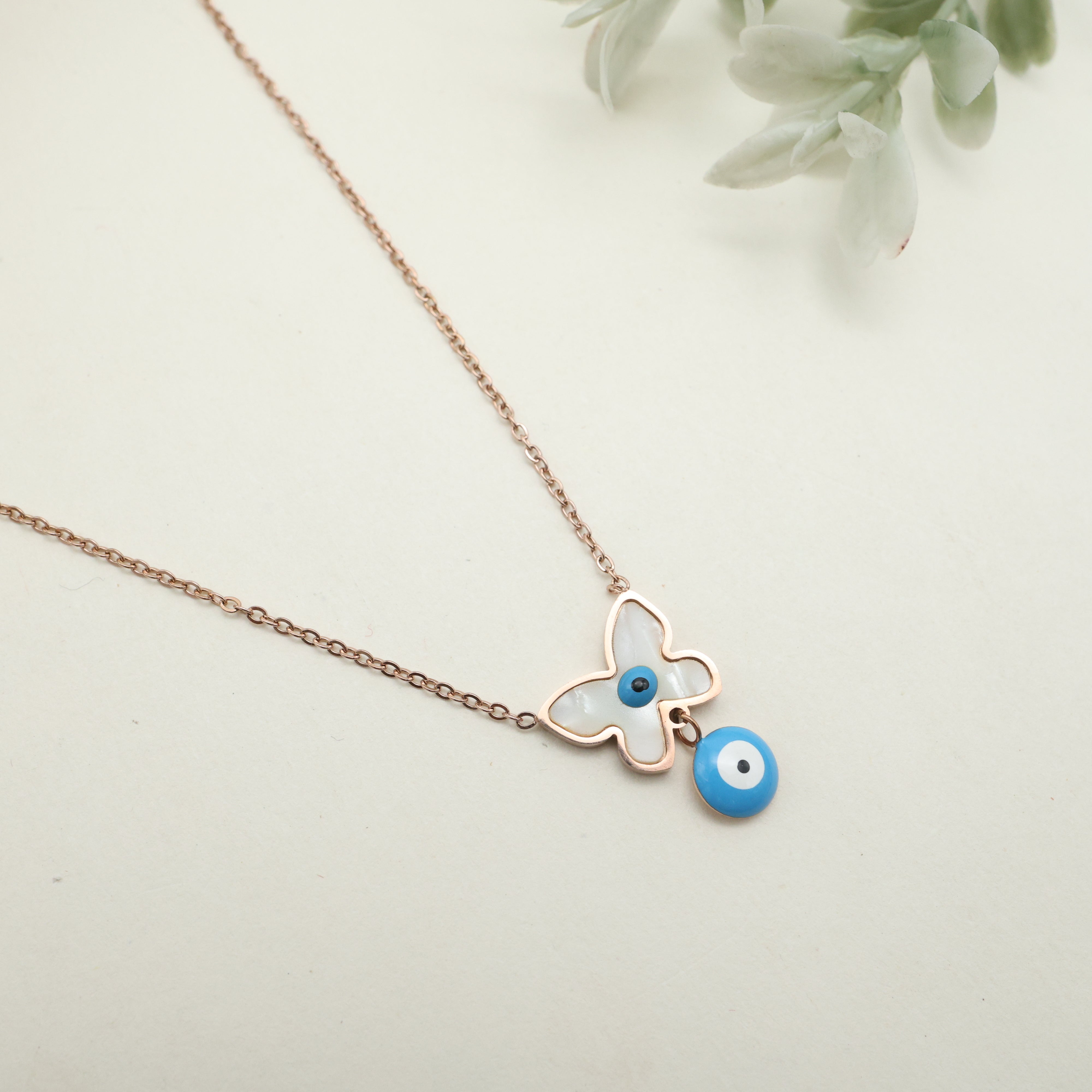 ROSE GOLD TONE ANTI TARNISH SHORT CHAIN - WHITE EVIL EYE BUTTERFLY