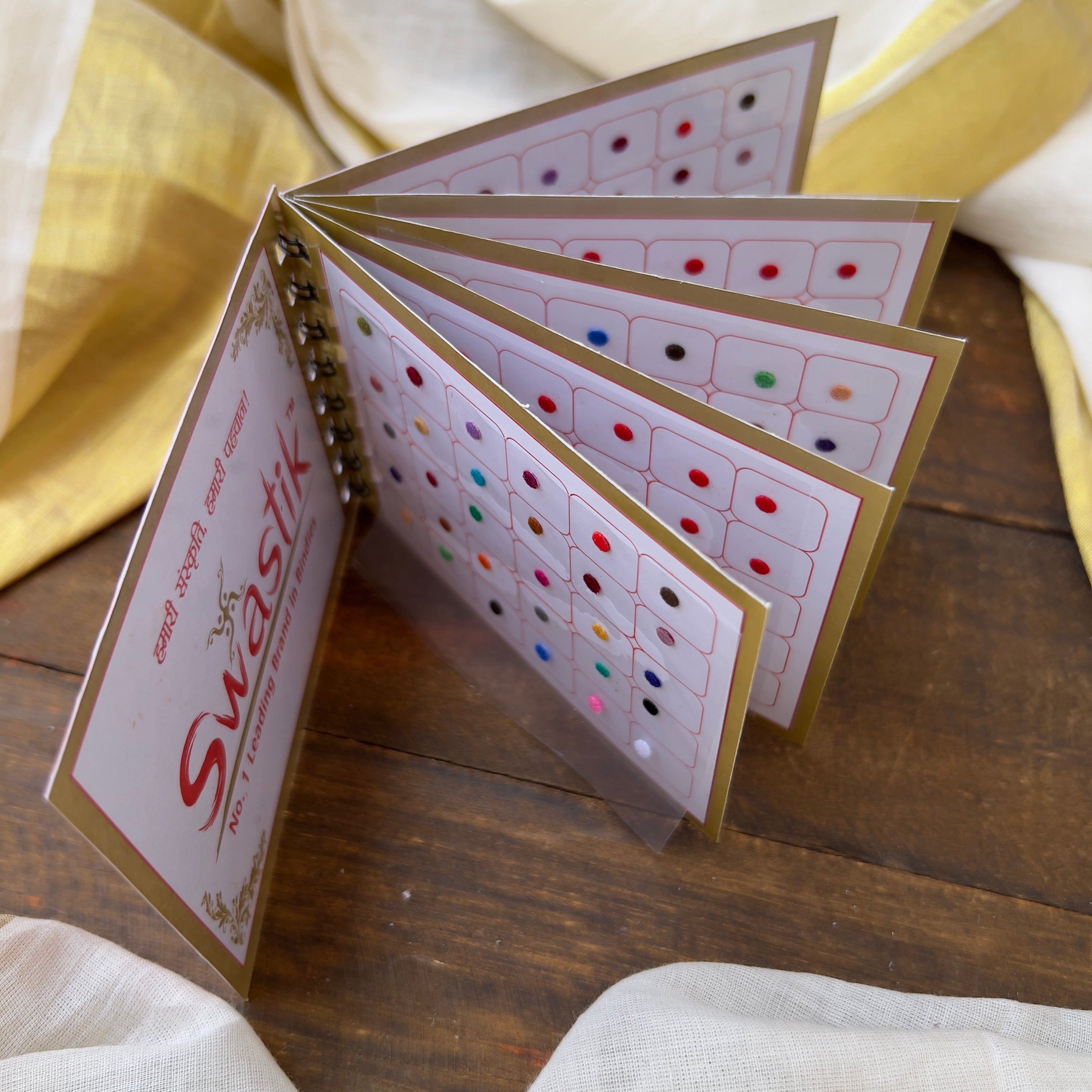 Colour Plain Round Bindi Book - Swastik Mini Range - BB008