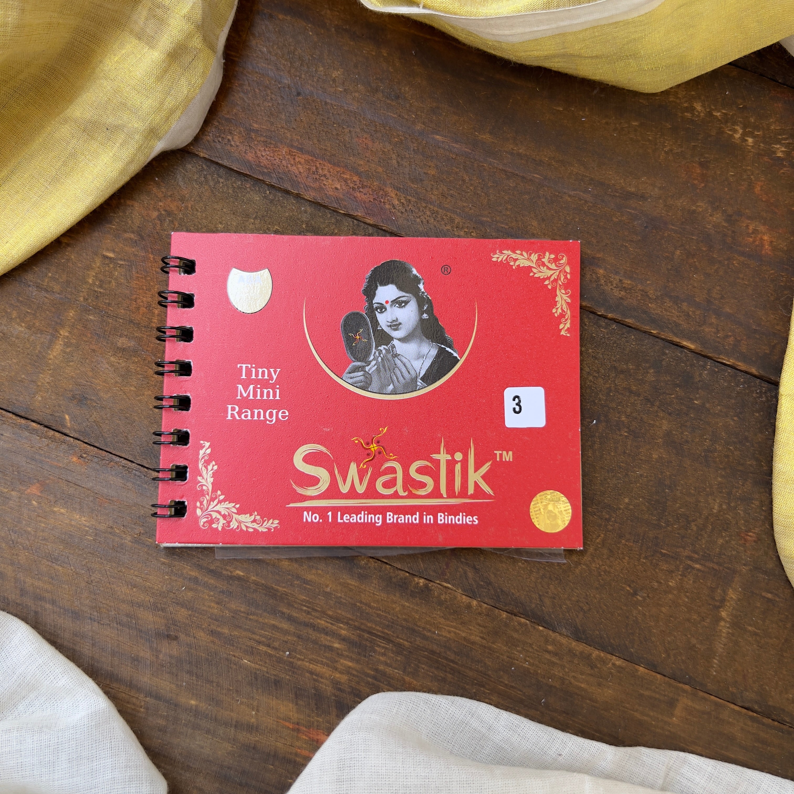 Colour Plain Round Bindi Book - Swastik Mini Range - BB008