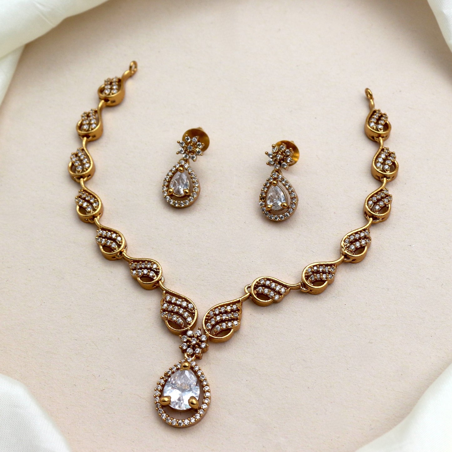 Antique Gold AD Tilak Drop Bridal Necklace Set - White