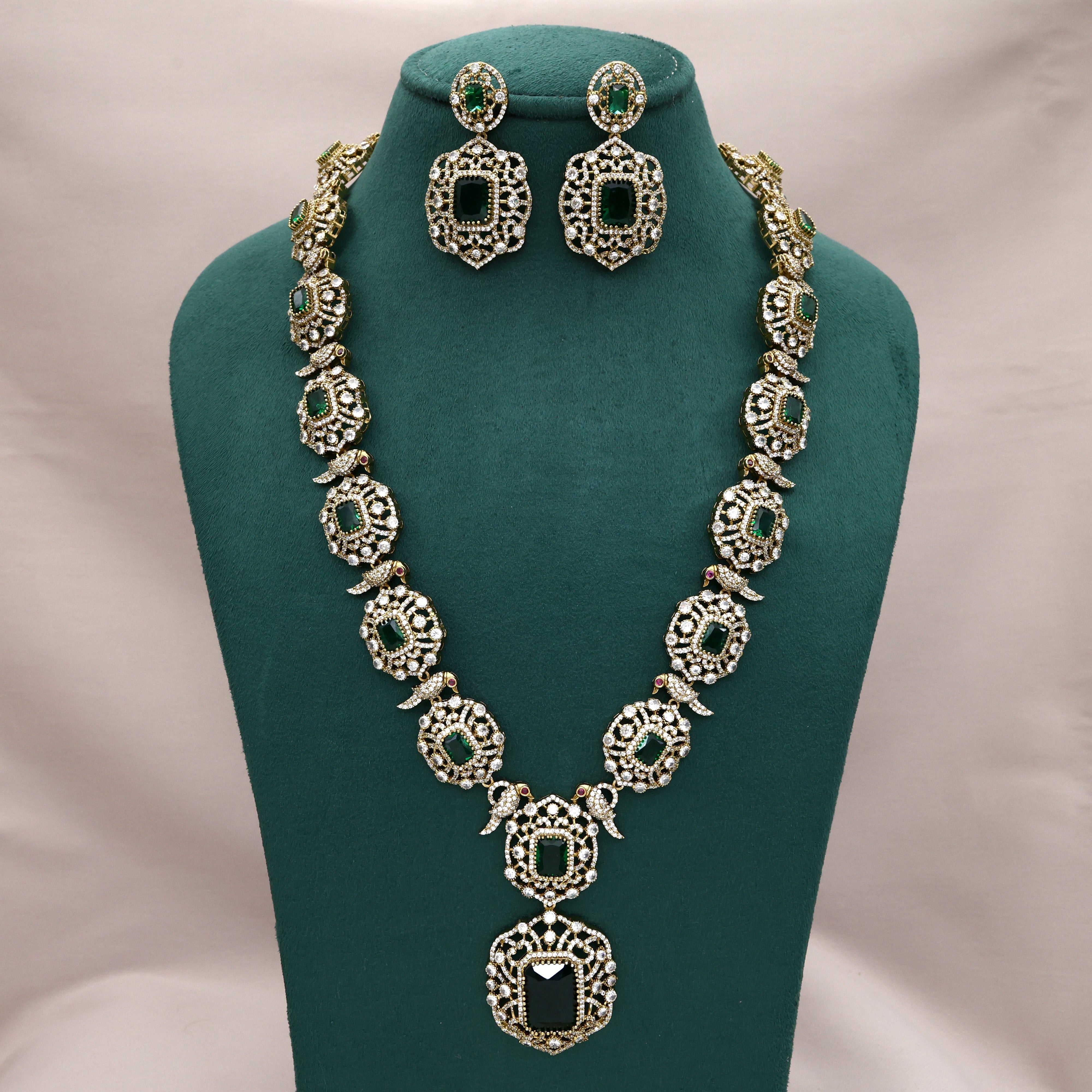 Premium Diamond Look Nita Ambani Inspired Mid Length Necklace Set - Emerald Green