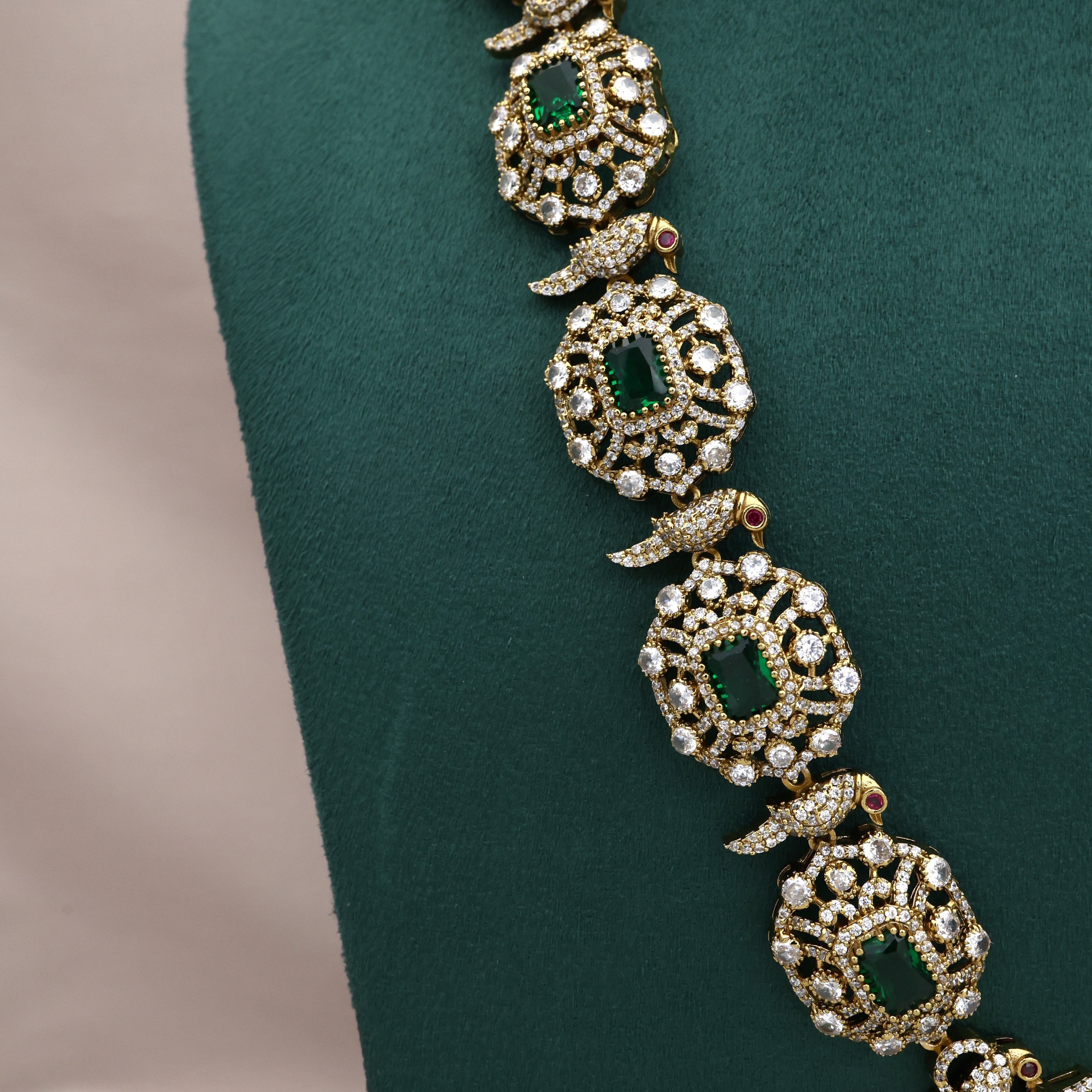 Premium Diamond Look Nita Ambani Inspired Mid Length Necklace Set - Emerald Green