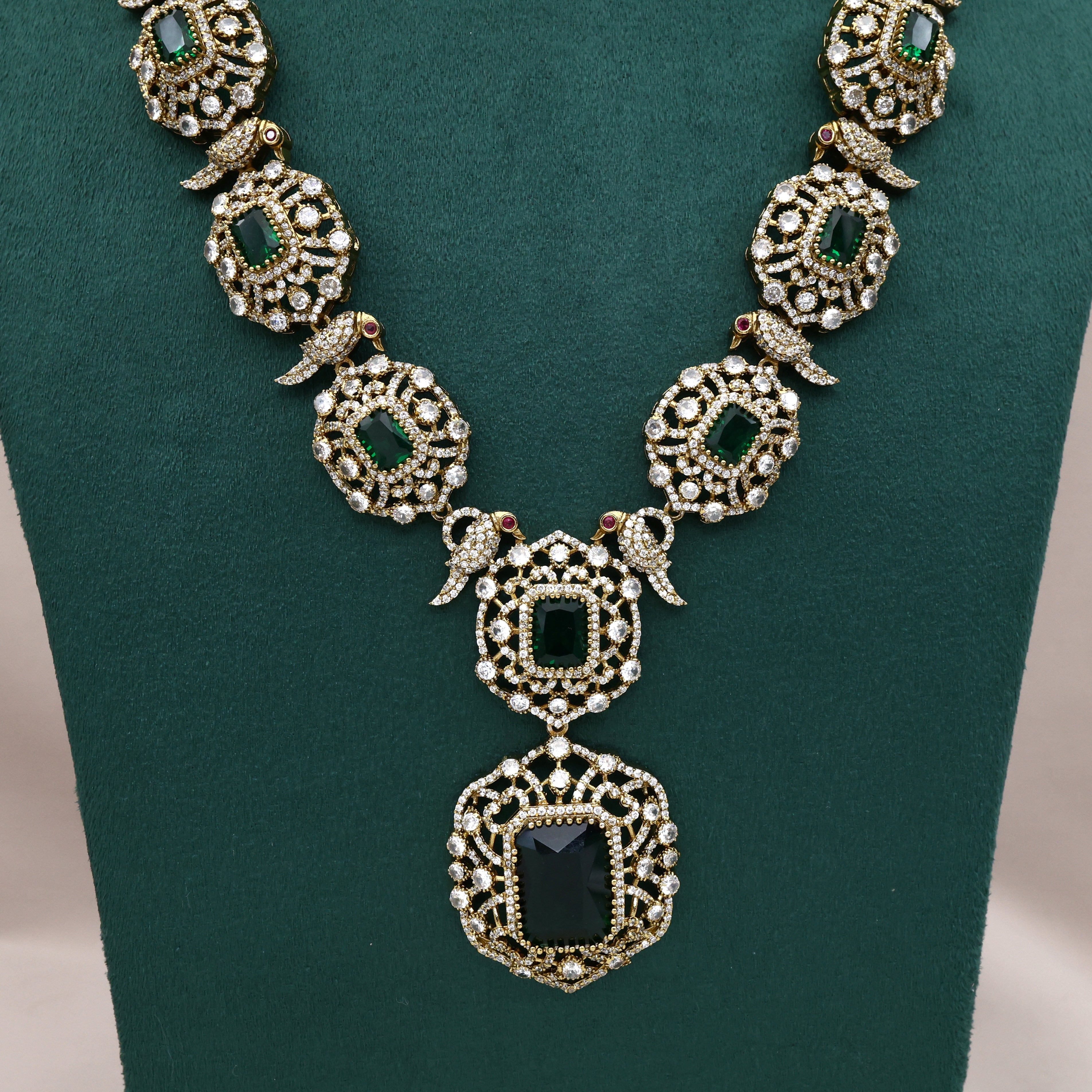 Premium Diamond Look Nita Ambani Inspired Mid Length Necklace Set - Emerald Green
