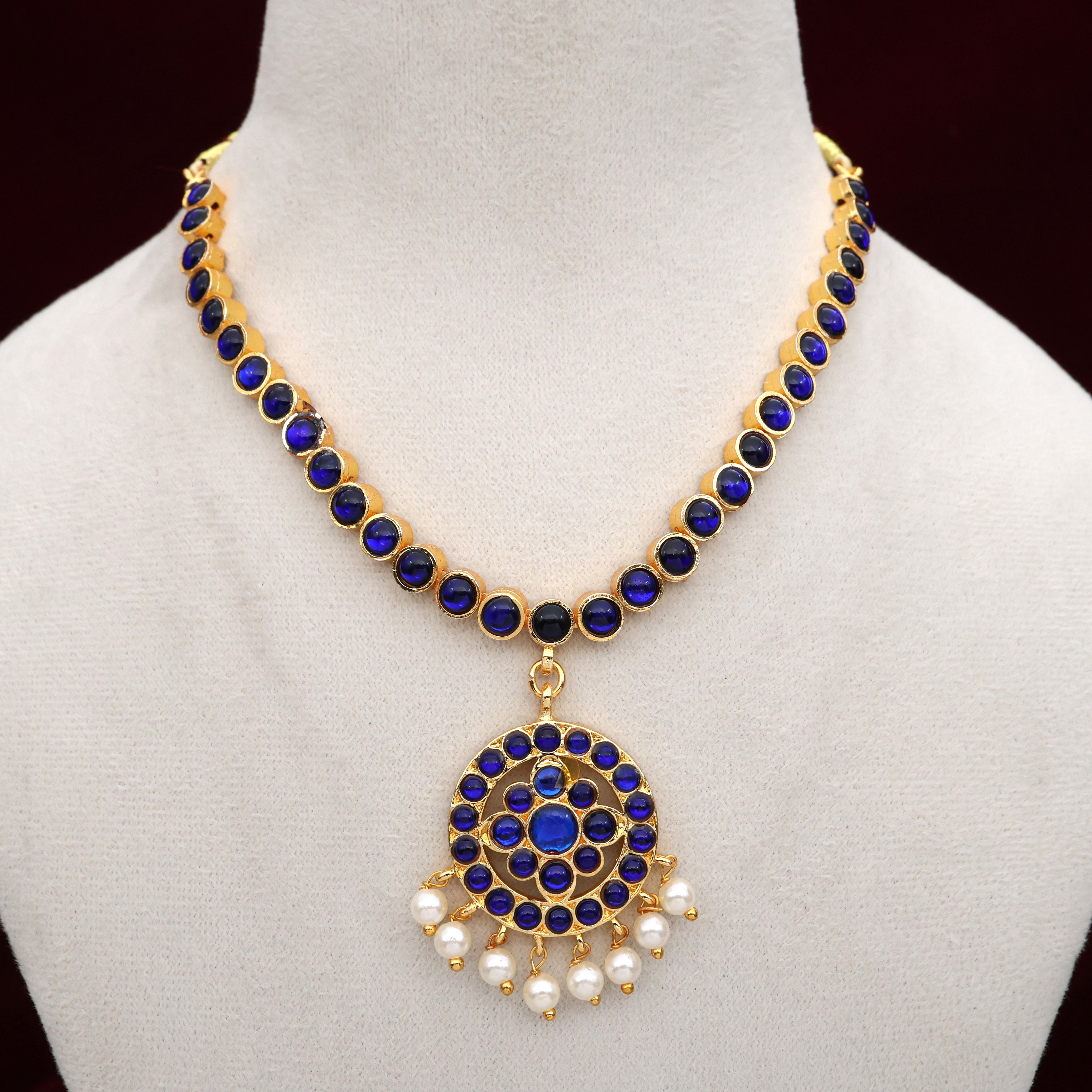 Budget Friendly Gold Tone Flower Chakra Attigai Necklace- Blue