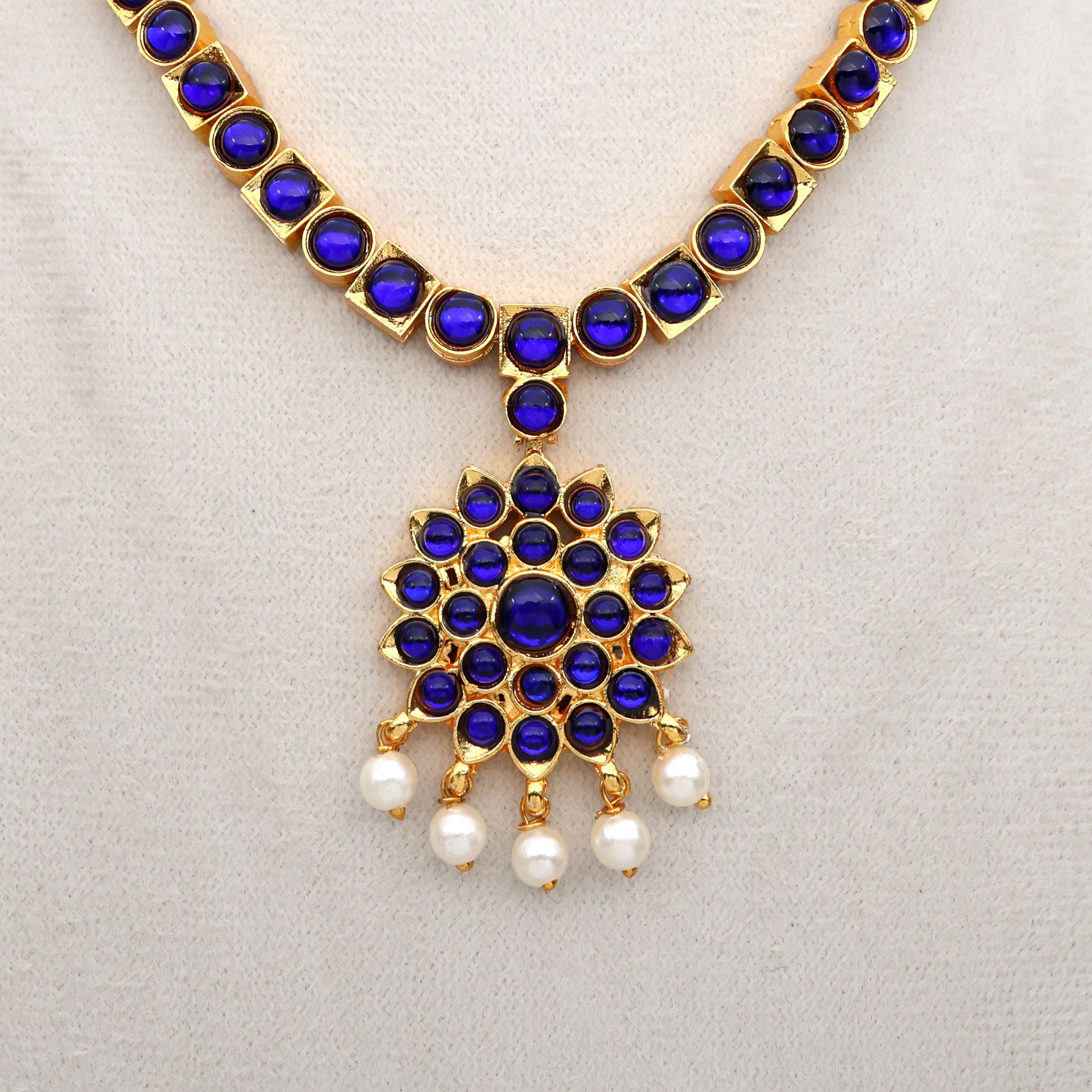 Budget Friendly Gold Tone Square Stones Flower Pendant Attigai Necklace - Blue