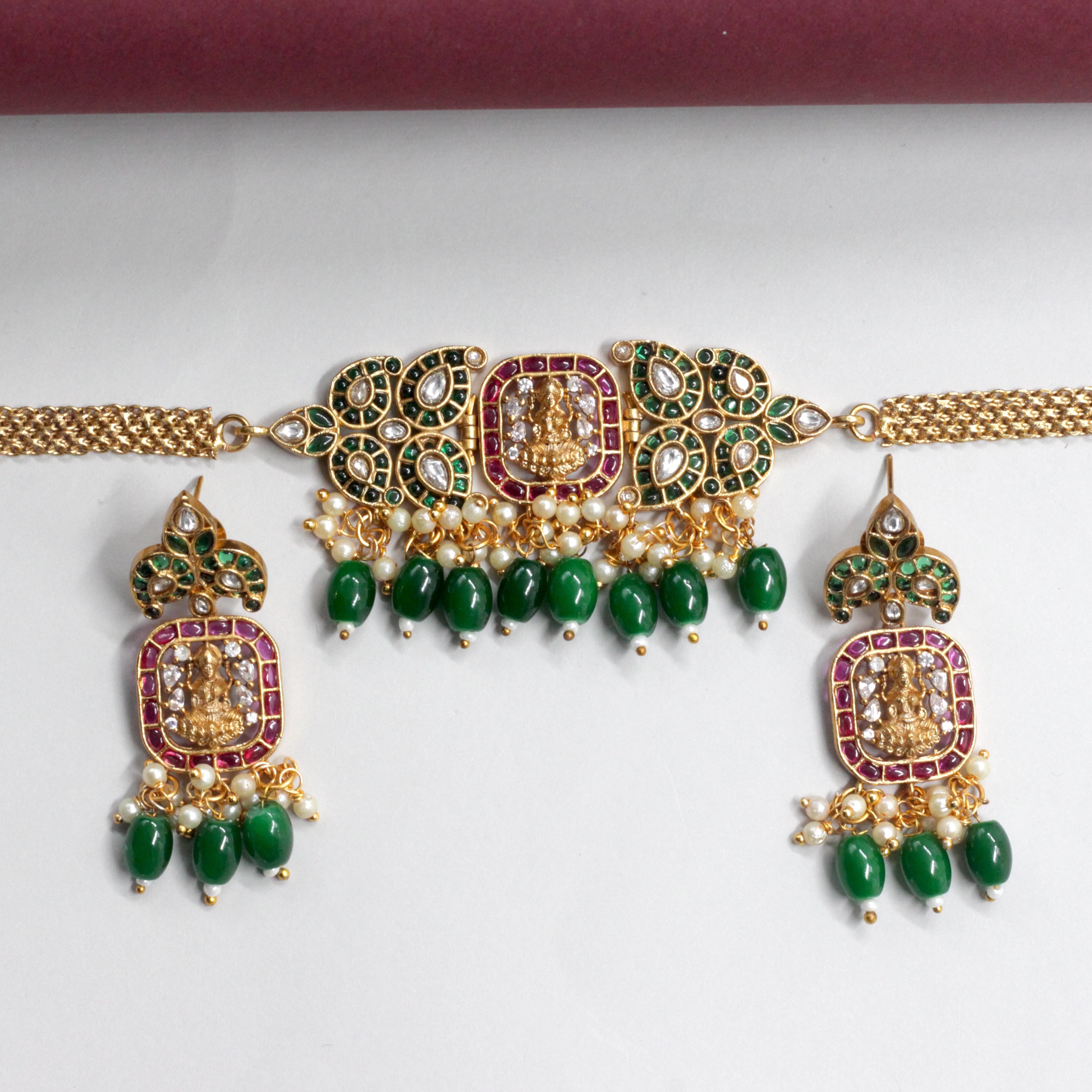 Antique Matte Mahalakshmi Pendant Double Leaf AD Kemp Choker Set - Green with Red