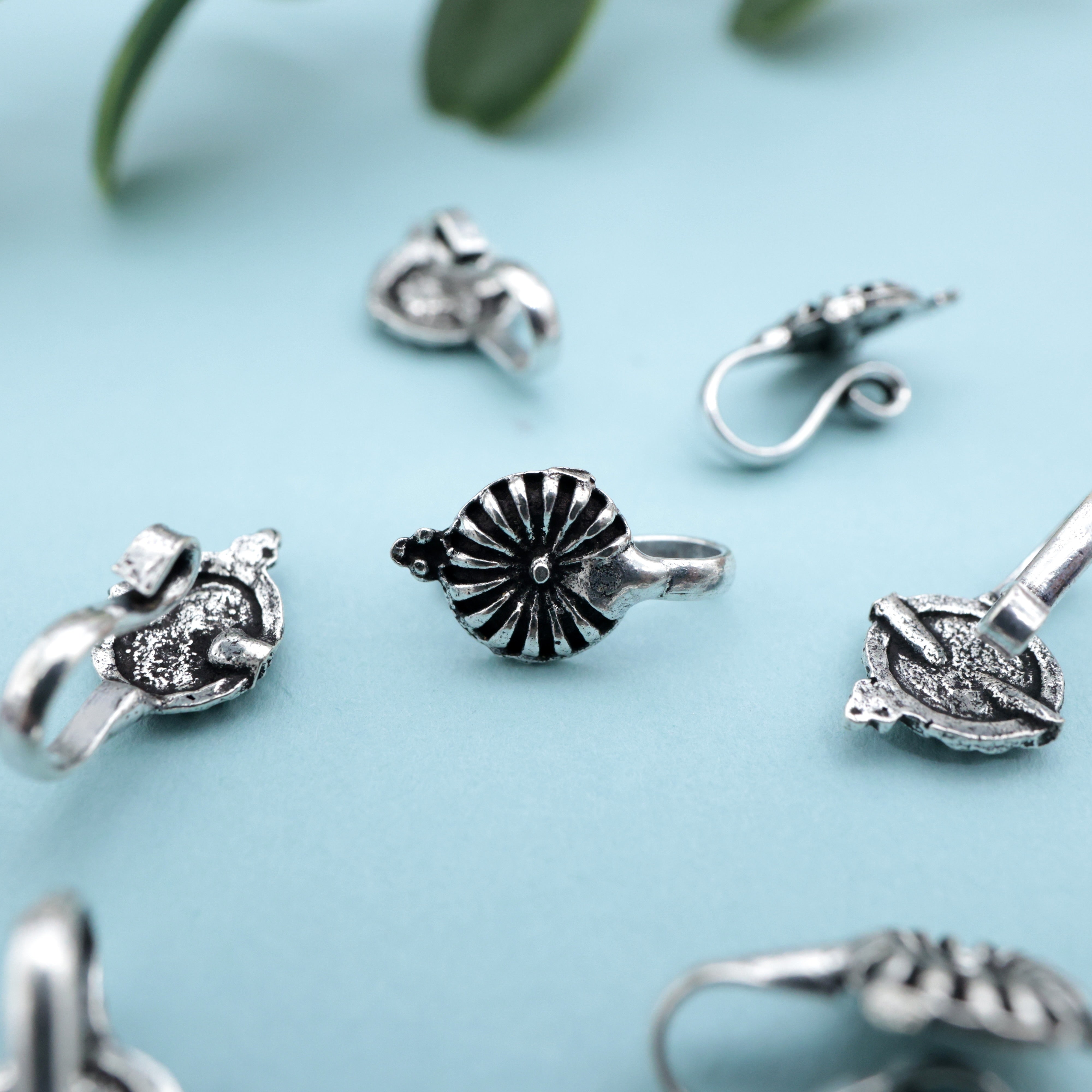 GERMAN SILVER OXIDISED CHAKRI FLOWER CLIP ON NOSEPIN - GERMAN SILVER NOSE PINS FOR NON-PIERCED NOSE