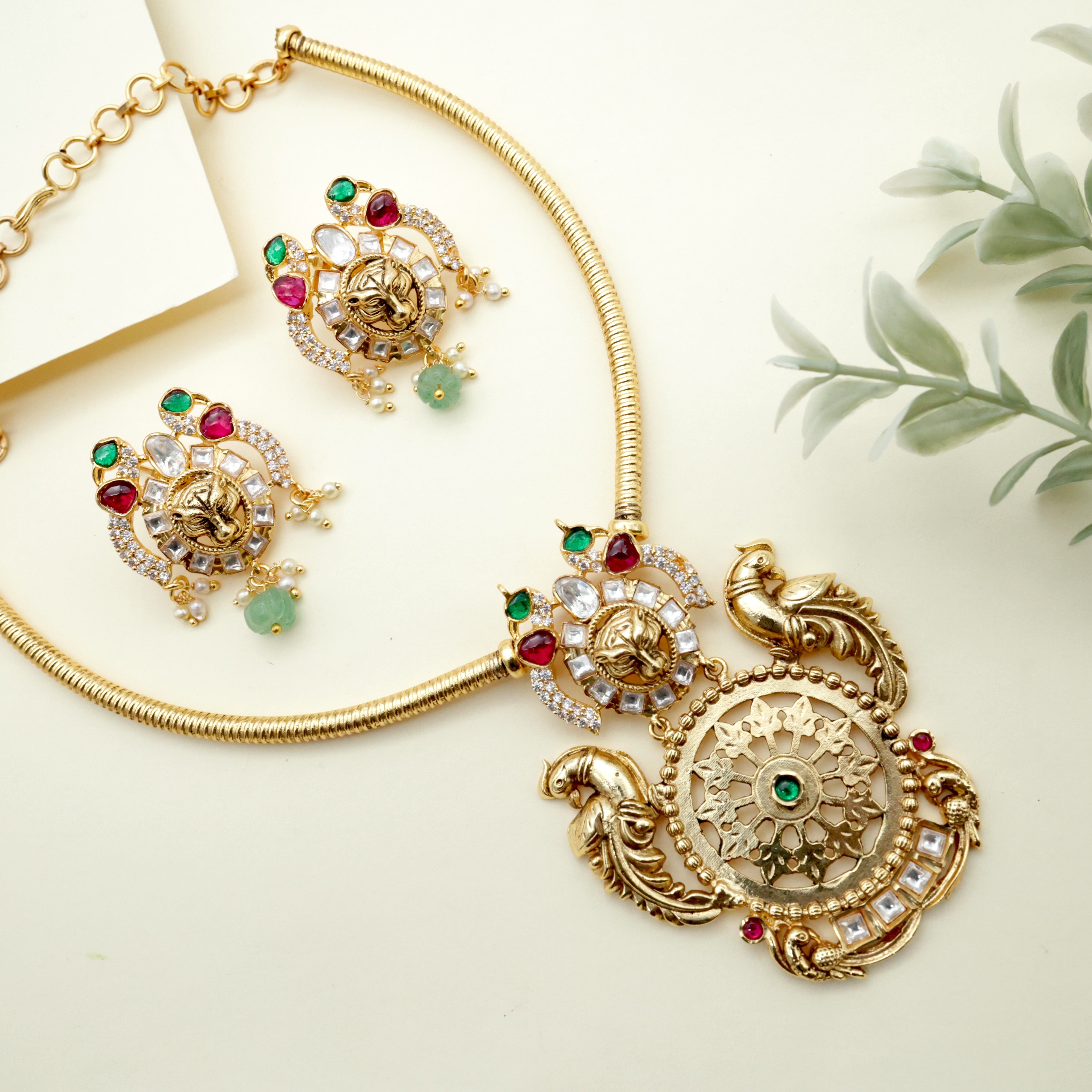 Royal Gold Look Alike Contemporary Rettapakshi Tiger Face Kundan Hasli Set