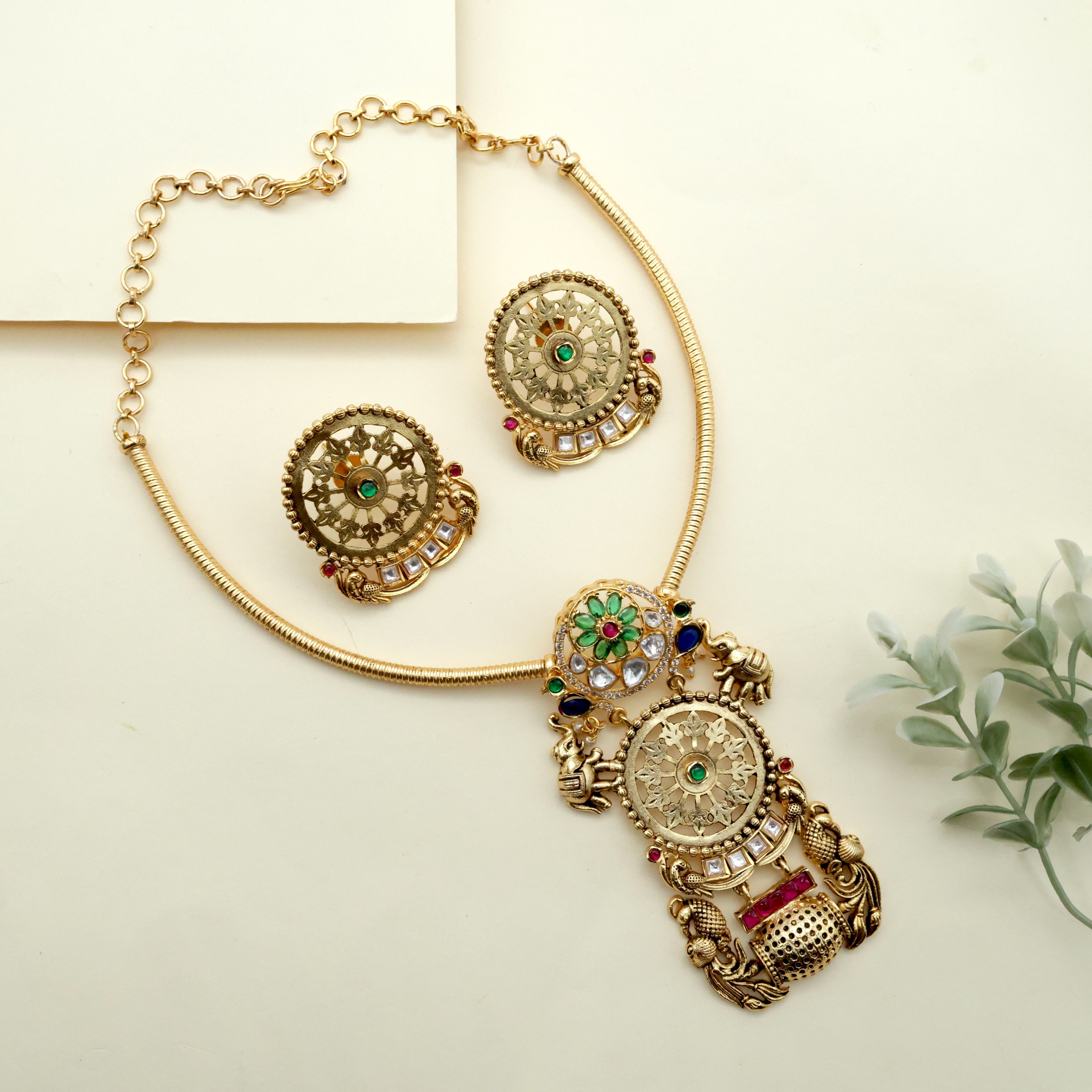 Royal Gold Look Alike Contemporary Rettapakshi Elephants Kundan Hasli Set