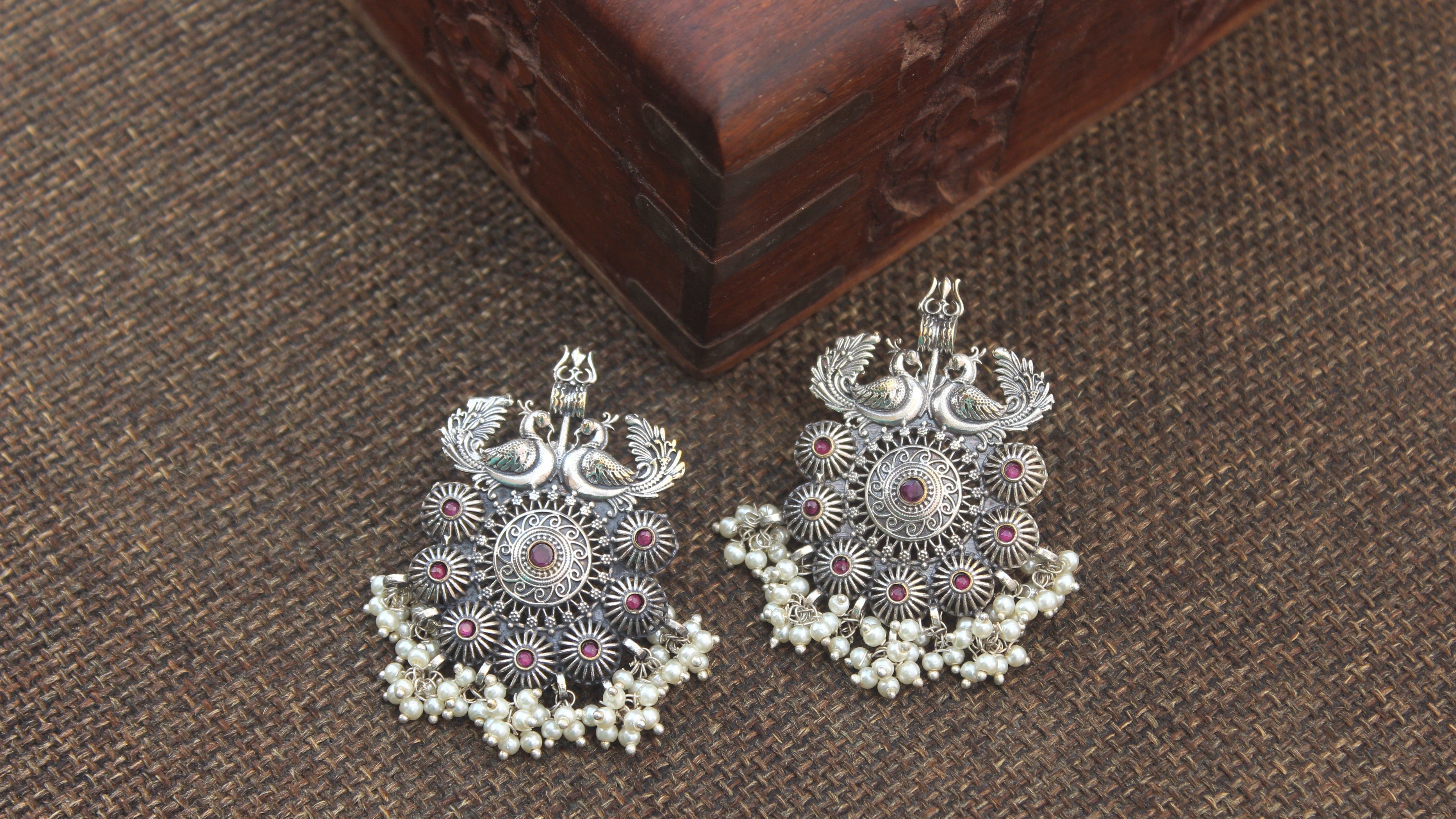 Premium Silver Look Alike Trishul Peacock Flower Chakra Chand Bali Earrings- Ruby