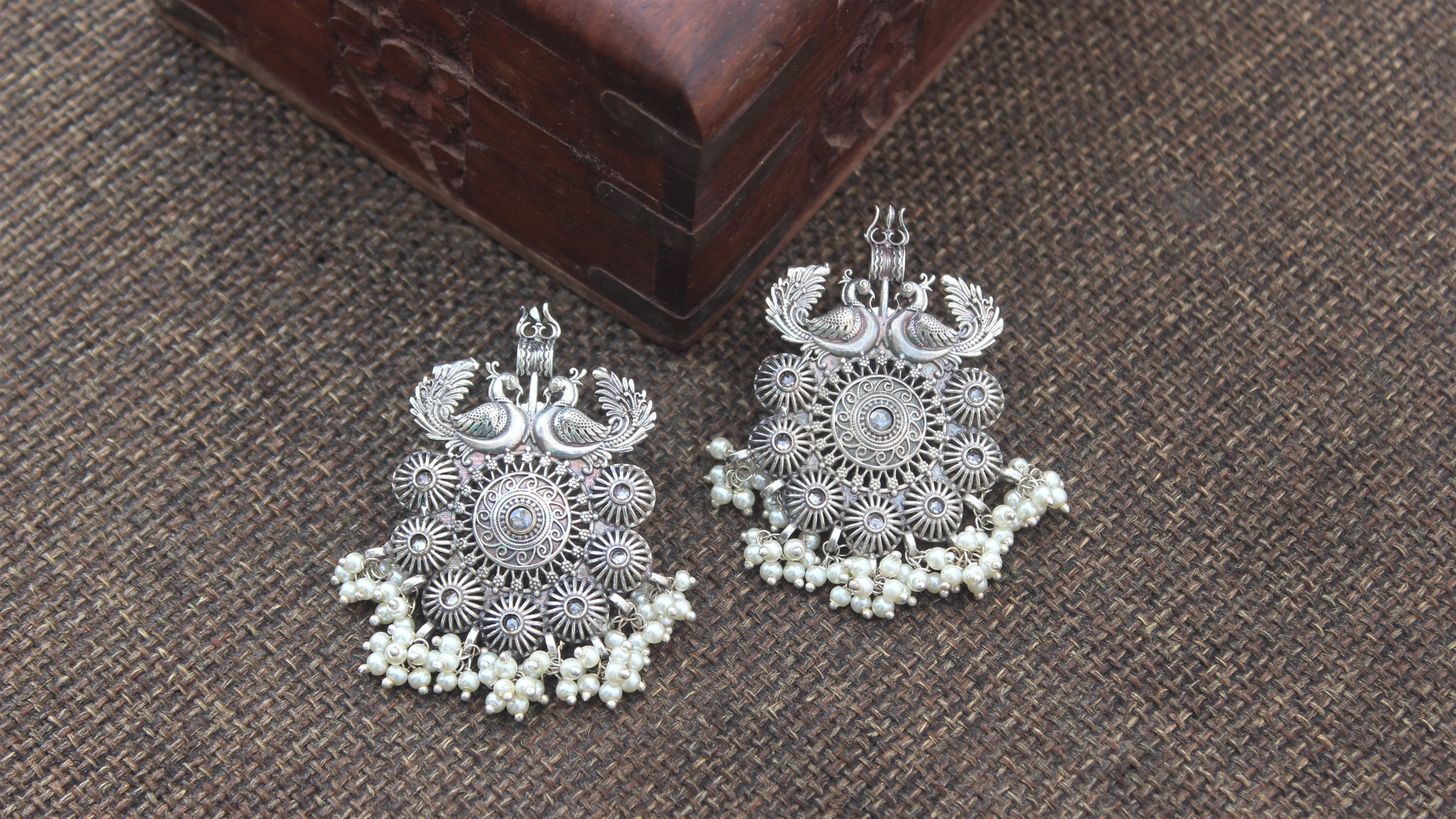 Premium Silver Look Alike Trishul Peacock Flower Chakra Chand Bali Earrings - White