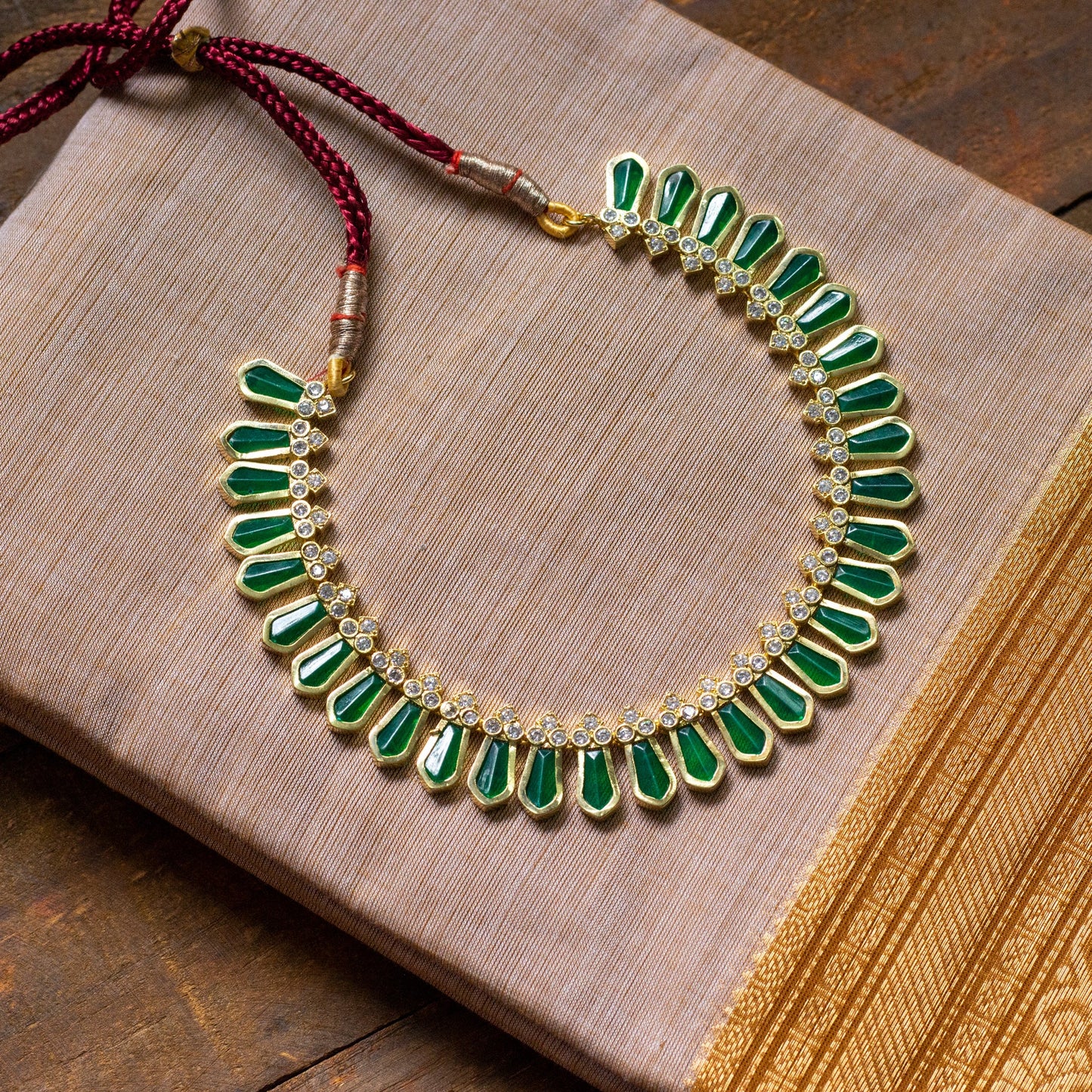 Gold Look AD Stones Studded Simple Nagapadam Necklace - Green