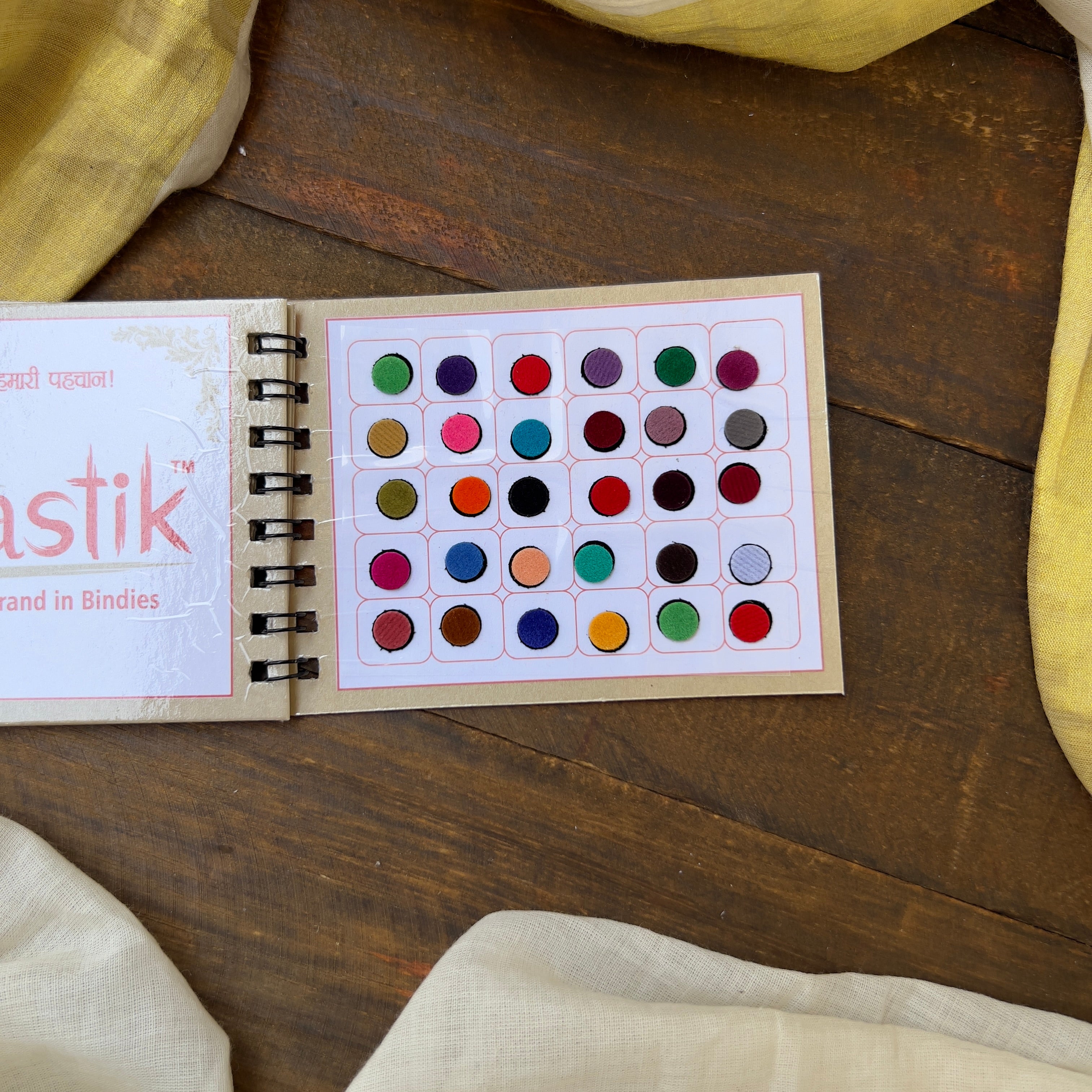 Colour Plain Round Bindi Book - Swastik Mini Range - BB009