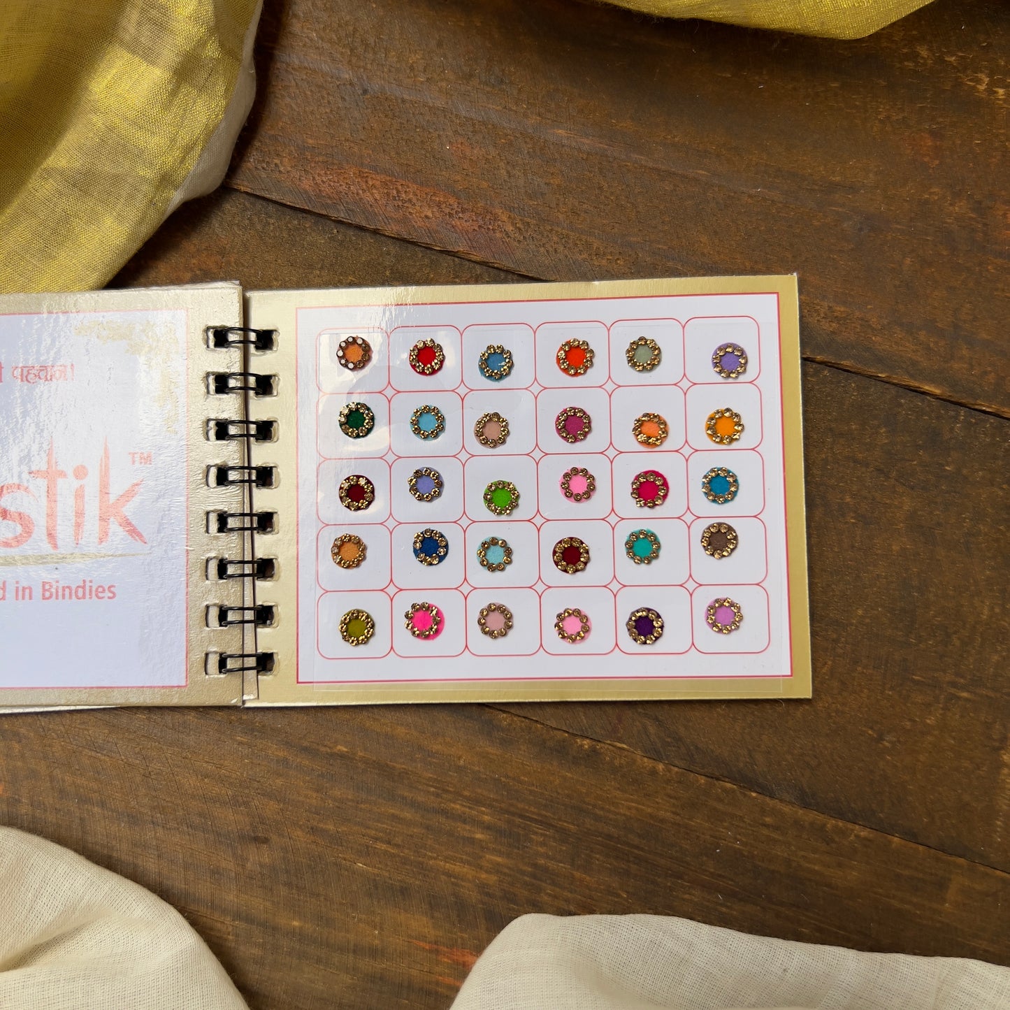 Colour Border Stone Round Bindi Book - Swastik Mini Range - BB012