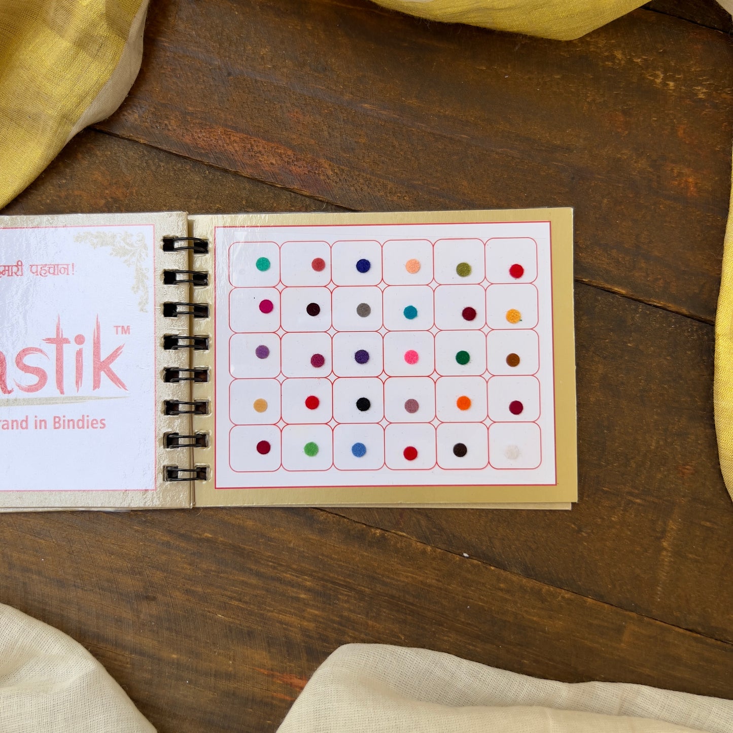 Colour Plain Round Bindi Book - Swastik Mini Range - BB007